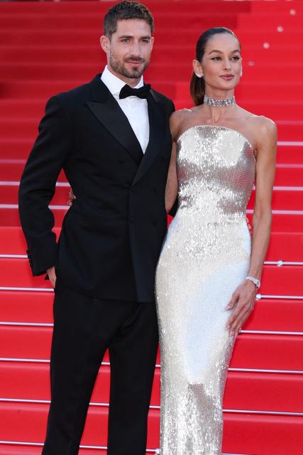 Paris FC's German goalkeeper Kevin Trapp and Brazilian model Izabel Goulart arrive for the screening of the film "Fjord" at the 79th edition of the Cannes Film Festival in Cannes, southern France on May 18, 2026. (Photo by Sameer AL-DOUMY / AFP)