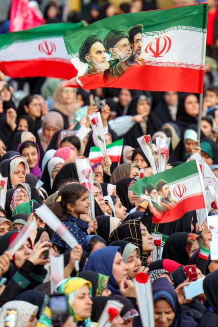 Revellers attend a public mass wedding ceremony at Imam Hossein Square in Tehran on May 18, 2026. Iran said on May 18 that it had responded to a new US proposal aimed at ending the war, adding that diplomatic exchanges continue despite Iranian media reports describing Washington's demands as excessive. Washington and Tehran have been swapping proposals in an effort to end the conflict which the US and Israel launched on February 28, but they have held only a single round of talks despite a fragile ceasefire. (Photo by AFP) / 
