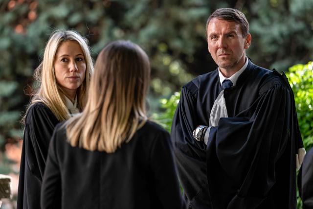 Defense lawyers Arnaud Julien (R) and Charlotte Barriol (L) are pictured during a break in the trial of Guillaume B., who is accused of multiple acts of abuse against his partner over seven years, from 2015 to 2020, at the Alpes-de-Haute-Provence court in Digne-les-Bains, southeastern France, on May 18, 2026. The trial of Guillaume B., accused of subjecting his partner to seven years of abuse and rape accompanied by acts of torture, began on May 18, 2026 at the Assize Court in Digne-les-Bains (Alpes-de-Haute-Provence), where he faces a life sentence. (Photo by MIGUEL MEDINA / AFP)