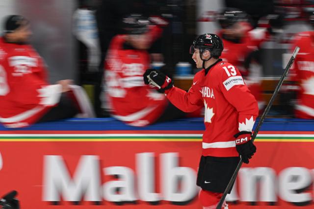 Canada’s forward #13 Gabriel Vilardi celebrates scoring his team's second goal during the groupe B match between Canada and Denmark at the IIHF Ice Hockey Men's World Championship at BFC Arena, in Fribourg, Switzerland, on May 18, 2026. (Photo by Fabrice COFFRINI / AFP)