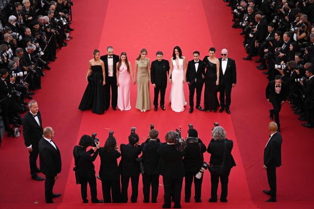 (From L) Swedish actress Lisa Carlehed, Romanian-US actor Sebastian Stan, Romanian actress Vanessa Ceban, Romanian director, screenwriter and producer Cristian Mungiu, Norwegian actress Renate Reinsve, Norwegian actor Jonathan Ciprian Breazu, Norwegian actress Lisa Loven Kongsli, Norwegian actor Markus Scarth Tonseth arrive for the screening of the film "Fjord" at the 79th edition of the Cannes Film Festival in Cannes, southern France on May 18, 2026. (Photo by Antonin THUILLIER / AFP)