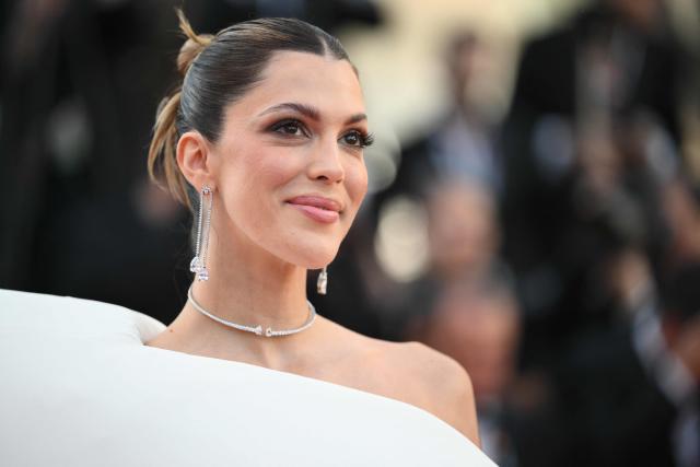French model and former Miss France Iris Mittenaere arrives for the screening of the film "Fjord" at the 79th edition of the Cannes Film Festival in Cannes, southern France on May 18, 2026. (Photo by Olivier CHASSIGNOLE / AFP)