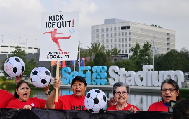 Sofi Stadium workers, including cooks, bartenders, dishwashers, servers and cashiers, protest outside the stadium, ahead of the 2026 FIFA World Cup in Inglewood, California, on May 18, 2026. Members of UNITE HERE Local 11 are fighting to keep ICE out of their workplace during the 2026 FIFA World Cup. (Photo by Frederic J. BROWN / AFP)