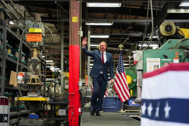 US Senator Eric Schmitt, a Republican of Missouri waves as he arrives during an event with US Vice President JD Vance at Milbank Manufacturing Company in Kansas City, Missouri, on May 18, 2026. (Photo by Eric Lee / POOL / AFP)