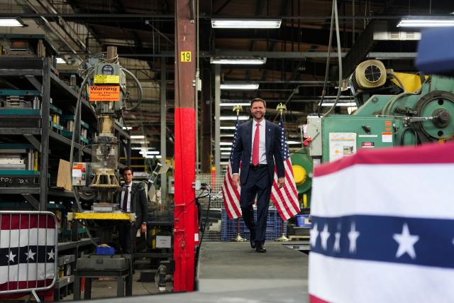 US Vice President JD Vance arrives to speak during an event at Milbank Manufacturing Company in Kansas City, Missouri, on May 18, 2026. (Photo by Eric Lee / POOL / AFP)