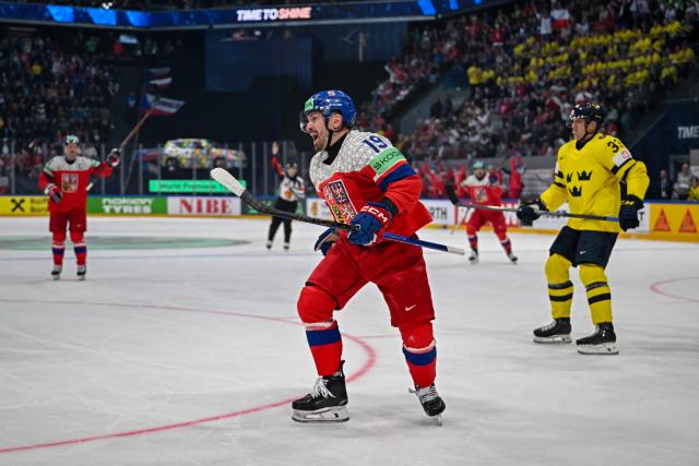 Czech Republic's forward #19 Jakub Flek celebrates after scoring his team's third goal during the Group B ice hockey match between Sweden and Czech Republic at the IIHF Ice Hockey Men's World Championship at BCF Arena in Fribourg on May 18, 2026. (Photo by Fabrice COFFRINI / AFP)