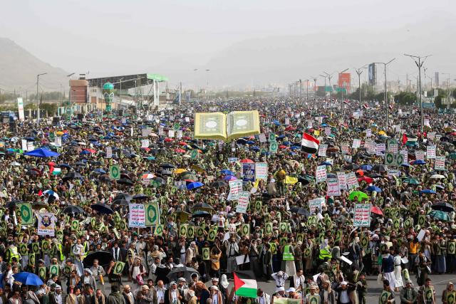 Supporters of the Iran-backed Houthi movement rally in solidarity with Lebanon in Sanaa on May 18, 2026. Hezbollah drew Lebanon into the Middle East war on March 2 with rocket fire at Israel in retaliation for the killing of Iran's supreme leader in US-Israeli strikes days earlier. (Photo by Mohammed HUWAIS / AFP)