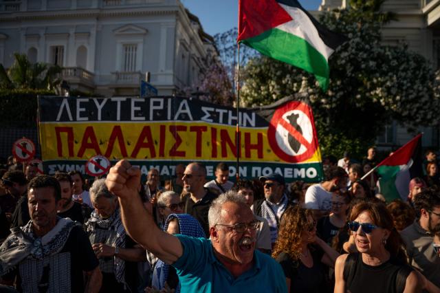 People hold a protest against the recent interception of the Global Solidarity Flotilla by the Israeli Navy near Cyprus outside the Ministry of Foreign Affairs in Athens on May 18, 2026. Israeli forces intercepted a Gaza-bound aid flotilla on May 18, 2026 after it sailed from Turkey the previous week, with Prime Minister Benjamin Netanyahu denouncing the mission as a "malicious scheme" intended to support Hamas, as the Global Sumud Flotilla vessels mark the latest in a series of attempts by activists to breach Israel's blockade of the Palestinian territory, with the last convoy intercepted by Israeli forces the previous month. (Photo by Aggelos NAKKAS / AFP)