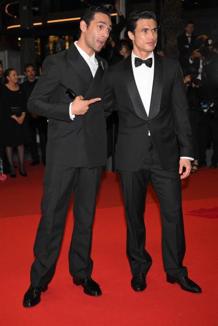 Mexican actor Diego Calva (L) and US actor Charles Melton arrive for the screening of the film "Her Private Hell" at the 79th edition of the Cannes Film Festival in Cannes, southern France on May 18, 2026. (Photo by Olivier CHASSIGNOLE / AFP)