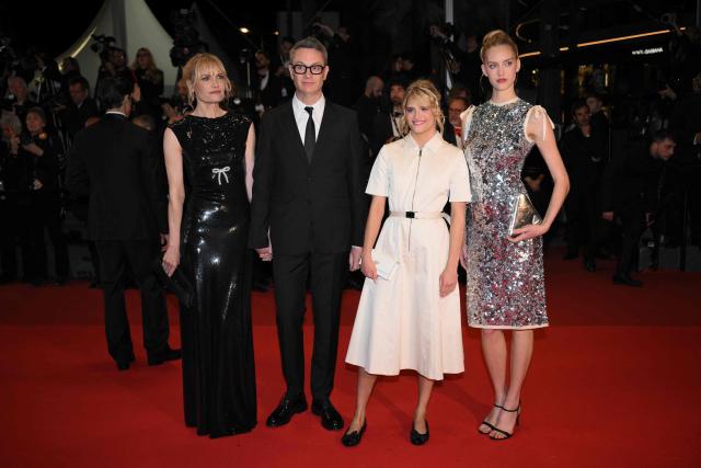 (From L) Danish actress and director Liv Corfixen her husband Danish director Nicolas Winding Refn and their daughter Danish actress Lizzielou Corfixen arrive for the screening of the film "Her Private Hell" at the 79th edition of the Cannes Film Festival in Cannes, southern France on May 18, 2026. (Photo by Olivier CHASSIGNOLE / AFP)