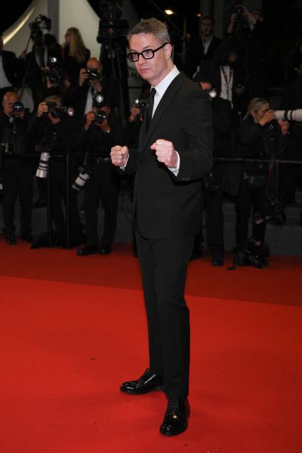 Danish director Nicolas Winding Refn arrives for the screening of the film "Her Private Hell" at the 79th edition of the Cannes Film Festival in Cannes, southern France on May 18, 2026. (Photo by Olivier CHASSIGNOLE / AFP)
