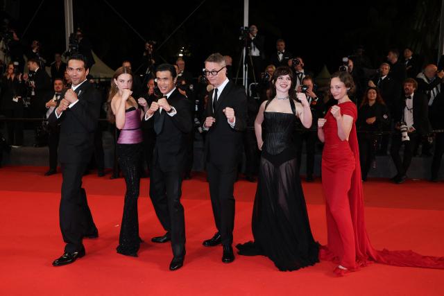 (From L) Mexican actor Diego Calva, US actress Kristine Froseth, US actor Charles Melton, Danish director Nicolas Winding Refn, US actress Sophie Thatcher and US actress Havana Rose Liu arrive for the screening of the film "Her Private Hell" at the 79th edition of the Cannes Film Festival in Cannes, southern France on May 18, 2026. (Photo by Sameer AL-DOUMY / AFP)