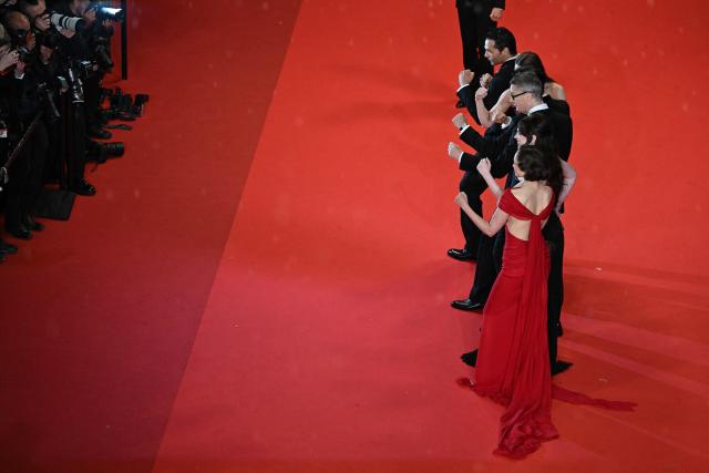 The cast arrives for the screening of the film "Her Private Hell" at the 79th edition of the Cannes Film Festival in Cannes, southern France on May 18, 2026. (Photo by Antonin THUILLIER / AFP)