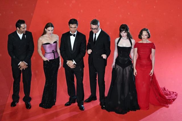 Mexican actor Diego Calva, Swedish actress Kristine Froseth, US actor Charles Melton, Danish director and screenwriter Nicolas Winding Refn, US actress Sophie Thatcher and US actress Havana Rose Liu arrive for the screening of the film "Fjord" at the 79th edition of the Cannes Film Festival in Cannes, southern France on May 18, 2026. (Photo by Antonin THUILLIER / AFP)