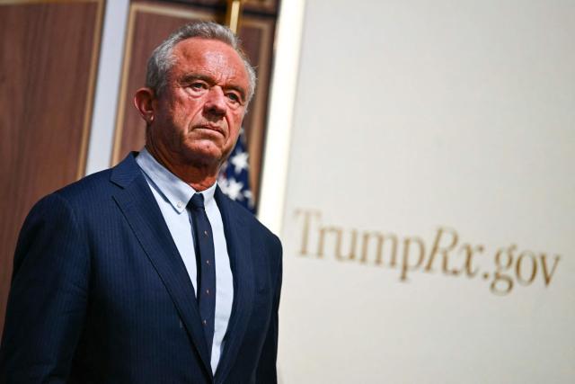 US Secretary of Health and Human Services Robert F. Kennedy Jr. listens to US President Donald Trump speak during a healthcare affordability event in the South Court Auditorium of The White House in Washington, DC, on May 18, 2026. (Photo by Kent NISHIMURA / AFP)