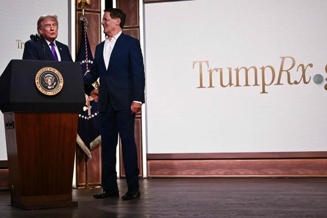 US President Donald Trump greets US businessman Mark Cuban during a healthcare affordability event in the South Court Auditorium of The White House in Washington, DC, on May 18, 2026. (Photo by Kent NISHIMURA / AFP)