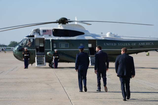 US Vice President JD Vance walks towards Marine Two after disembarking Air Force Two, following his visit to Kansas City, at Joint Base Andrews, Maryland, on May 18, 2026. (Photo by Eric Lee / POOL / AFP)