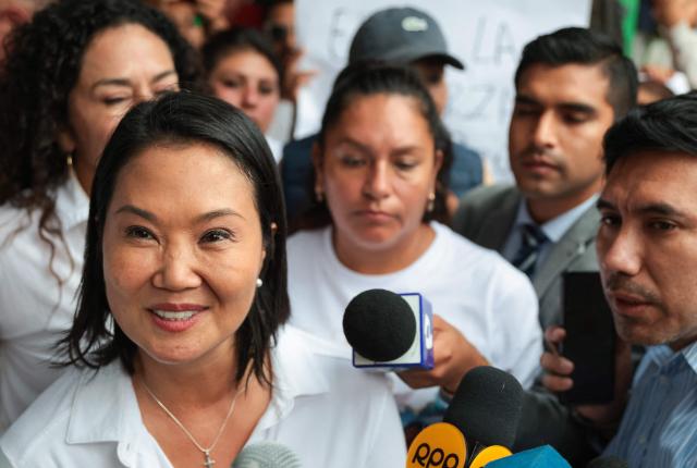 Peru's presidential candidate for the Fuerza Popular party, Keiko Fujimori, gestures as she speaks with the press during a campaign event at the Eden market in Callao, Peru on May 18, 2026. Right-wing candidate Keiko Fujimori and left-wing candidate Roberto Sanchez will face off on June 7 in Peru's presidential runoff, the electoral authority confirmed on May 17 when it officially proclaimed the results. (Photo by Connie FRANCE / AFP)