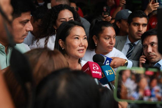 Peru's presidential candidate for the Fuerza Popular party, Keiko Fujimori, speaks with the press during a campaign event at the Eden market in Callao, Peru on May 18, 2026. Right-wing candidate Keiko Fujimori and left-wing candidate Roberto Sanchez will face off on June 7 in Peru's presidential runoff, the electoral authority confirmed on May 17 when it officially proclaimed the results. (Photo by Connie FRANCE / AFP)