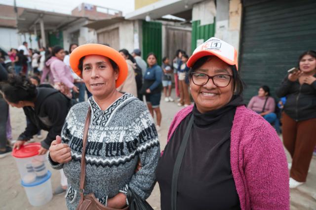 Supporters of Peru's presidential candidate Keiko Fujimori of the Fuerza Popular party attend a campaign event at the Eden market in Callao, Peru on May 18, 2026. Right-wing candidate Keiko Fujimori and left-wing candidate Roberto Sanchez will face off on June 7 in Peru's presidential runoff, the electoral authority confirmed on May 17 when it officially proclaimed the results. (Photo by Connie FRANCE / AFP)