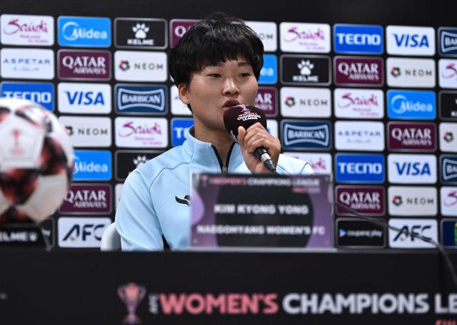North Korea's Naegohyang Women's FC player Kim Kyong Yong speaks during a press conference at Suwon Sports Complex in Suwon on May 19, 2026, ahead of the Women's Asian Champions League semi-final football match against South Korea's Suwon FC Women. (Photo by JUNG YEON-JE / POOL / AFP)