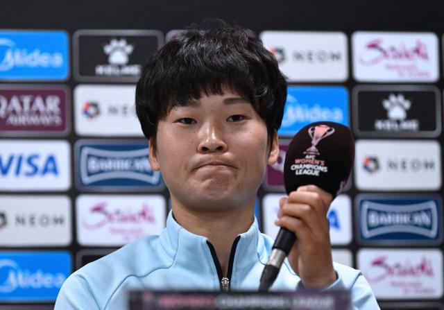 North Korea's Naegohyang Women's FC player Kim Kyong Yong attends a press conference at Suwon Sports Complex in Suwon on May 19, 2026, ahead of the Women's Asian Champions League semi-final football match against South Korea's Suwon FC Women. (Photo by JUNG YEON-JE / POOL / AFP)