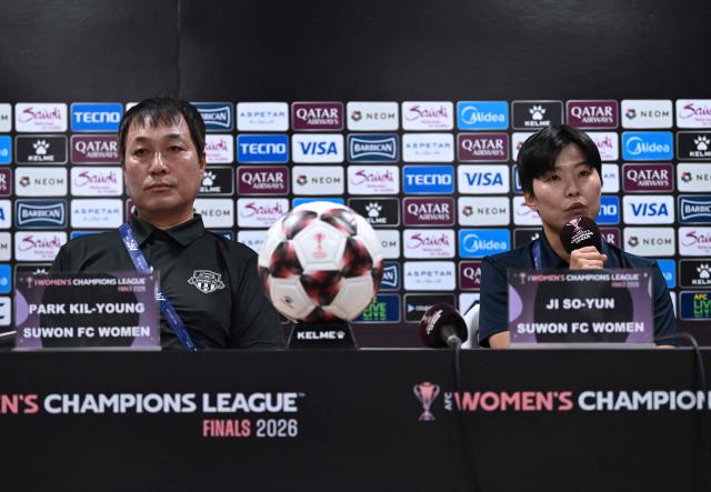 South Korea's Suwon FC Women head coach Park Kil-young (L) and player Ji So-yun (R) attend a press conference at Suwon Sports Complex in Suwon on May 19, 2026, ahead of the Women's Asian Champions League semi-final football match against North Korea's Naegohyang Women's FC. (Photo by JUNG YEON-JE / POOL / AFP)