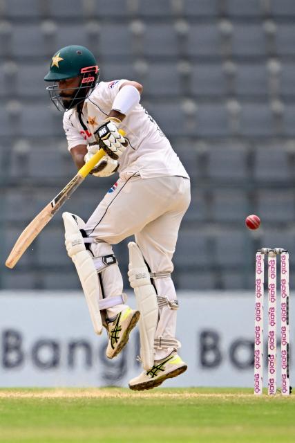 Pakistan’s Sajid Khan plays a shot during the fifth day of the second Test cricket match between Bangladesh and Pakistan at the Sylhet International Cricket Stadium in Sylhet on May 20, 2026. (Photo by MUNIR UZ ZAMAN / AFP)