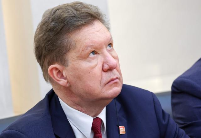 In this pool photograph distributed by the Russian state agency Sputnik, Gazprom CEO Alexey Miller attends a meeting with Russian President Vladimir Putin (not pictured) and China's President Xi Jinping (not pictured) in Beijing on May 20, 2026. (Photo by Alexander KAZAKOV / POOL / AFP)