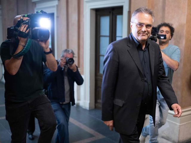 Austrian former intelligence official Egisto Ott arrives for a session of his trial at the criminal court in Vienna, Austria, where the verdict was expected on May 20, 2026. Ott is currently standing trial on a slew of charges that include handing over sensitive devices and selling secret information to Russia. Ott, who denies all the charges against him, is also accused of having passed secret information for years to Jan Marsalek, the former chief operating officer of Germany's collapsed payment processing firm Wirecard, who is suspected of working for Russia's intelligence services. (Photo by Joe Klamar / AFP)