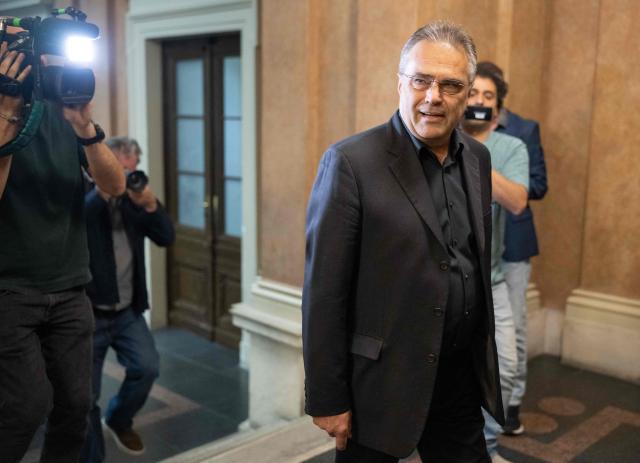 Austrian former intelligence official Egisto Ott arrives for a session of his trial at the criminal court in Vienna, Austria, where the verdict was expected on May 20, 2026. Ott is currently standing trial on a slew of charges that include handing over sensitive devices and selling secret information to Russia. Ott, who denies all the charges against him, is also accused of having passed secret information for years to Jan Marsalek, the former chief operating officer of Germany's collapsed payment processing firm Wirecard, who is suspected of working for Russia's intelligence services. (Photo by Joe Klamar / AFP)