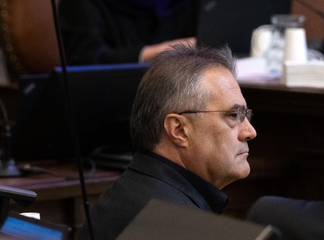 Austrian former intelligence official Egisto Ott has taken his seat to attend a session of his trial at the criminal court in Vienna, Austria, where the verdict was expected on May 20, 2026. Ott is currently standing trial on a slew of charges that include handing over sensitive devices and selling secret information to Russia. Ott, who denies all the charges against him, is also accused of having passed secret information for years to Jan Marsalek, the former chief operating officer of Germany's collapsed payment processing firm Wirecard, who is suspected of working for Russia's intelligence services. (Photo by Joe Klamar / AFP)