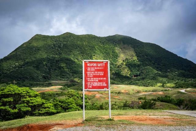 A weapons safety instruction sign stands at the US Marine Corps' Camp Schwab in Nago, Okinawa prefecture on May 20, 2026. (Photo by Yuichi YAMAZAKI / AFP)