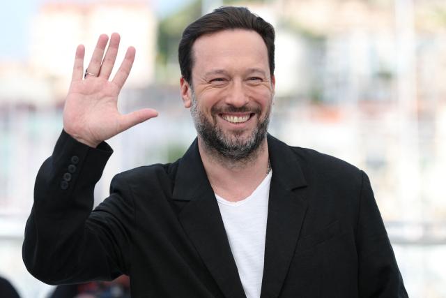 Russian actor Dmitriy Mazurov poses during a photocall of the film "Minotaure" (Minotaur) at the 79th edition of the Cannes Film Festival in Cannes, southern France on May 20, 2026. (Photo by Sameer AL-DOUMY / AFP)