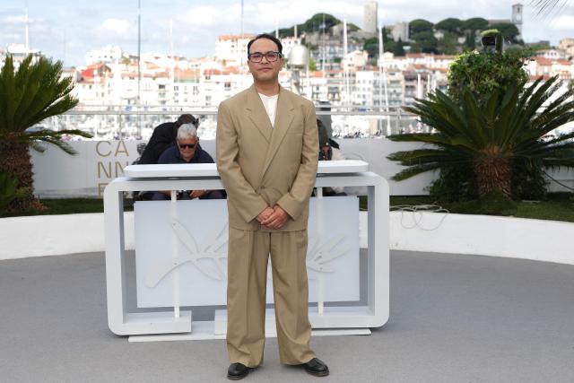 Nepalese director and screenwriter Abinash Bikram Shah poses during a photocall of the film "Les Elephants dans la brume" (Elephants in the Fog) at the 79th edition of the Cannes Film Festival in Cannes, southern France on May 20, 2026. (Photo by Sameer AL-DOUMY / AFP)