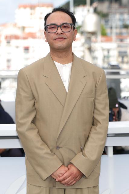 Nepalese director and screenwriter Abinash Bikram Shah poses during a photocall of the film "Les Elephants dans la brume" (Elephants in the Fog) at the 79th edition of the Cannes Film Festival in Cannes, southern France on May 20, 2026. (Photo by Sameer AL-DOUMY / AFP)