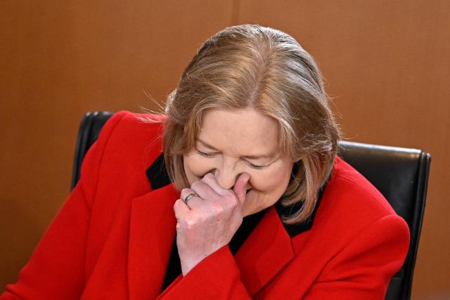 German Minister for Labour and Social Affairs Baerbel Bas laughs as she waits for the start of the weekly cabinet meeting at the Chancellery in Berlin on May 20, 2026. (Photo by Tobias SCHWARZ / AFP)