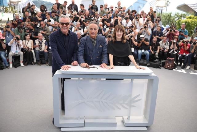 US actor Danny Huston, US actor Andy Garcia and US actress Rosemarie Dewitt pose during a photocall of the film "Diamond" at the 79th edition of the Cannes Film Festival in Cannes, southern France on May 20, 2026. (Photo by Valery HACHE / AFP)