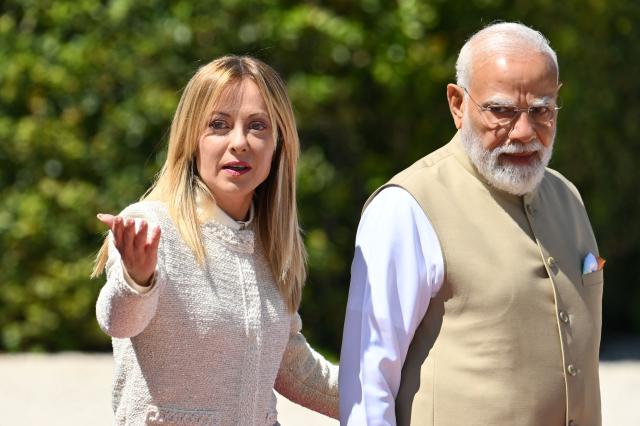 Italy’s prime minister Giorgia Meloni welcomes her counterpart India’s Narendra Modi for a meeting at Villa Doria Pamphili in Rome on May 20, 2026. (Photo by Alberto PIZZOLI / AFP)