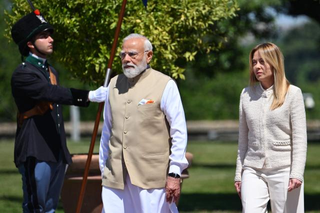 Italy’s Prime Minister Giorgia Meloni welcomes her counterpart India’s Narendra Modi for a meeting at Villa Doria Pamphili in Rome on May 20, 2026. (Photo by Alberto PIZZOLI / AFP)
