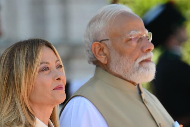 Italy’s Prime Minister Giorgia Meloni welcomes her counterpart India’s Narendra Modi for a meeting at Villa Doria Pamphili in Rome on May 20, 2026. (Photo by Alberto PIZZOLI / AFP)