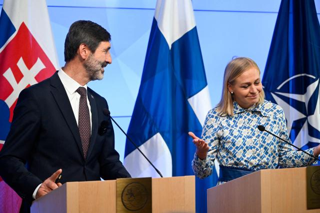 Finland's Foreign Ministeri Elina Valtonen (R) reacts with visiting Slovakia's Foreign Minister Juraj Blanar during a joint press conference in Helsinki, Finland on May 20, 2026. (Photo by Antti Aimo-Koivisto / Lehtikuva / AFP) / Finland OUT