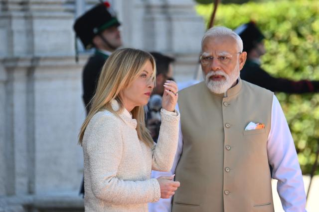 Italy’s Prime Minister Giorgia Meloni welcomes her counterpart India’s Prime Minister Narendra Modi for a meeting at Villa Doria Pamphili in Rome on May 20, 2026. (Photo by Alberto PIZZOLI / AFP)
