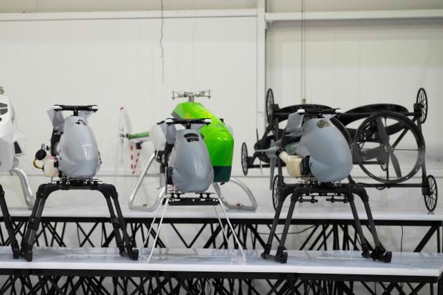 Drones are seen at the Prodrone research facility in Nagoya on May 20, 2026, as Japan pushes to expand military drone capabilities with nearly USD 850 million earmarked for unmanned defense systems in its 2026 defense budget. (Photo by ANDREW CABALLERO-REYNOLDS / AFP)