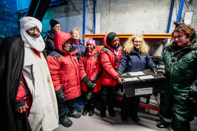 (FILES) Norway's Prime Minister Erna Solberg (back R), Norway's Agriculture and Food Minister Olaug V Bollestad (R) and Ghana's President Nana Addo Dankwa Akufo-Addo (2ndL) visit the international gene bank Svalbard Global Seed Vault (SGSV), on February 25, 2020 outside Longyearbyen on Spitsbergen, Norway. The Svalbard Global Seed Vault (SGSV) has been on May 20, 2026 awarded the Princess of Asturias Award for International Cooperation. (Photo by Lise Åserud / NTB Scanpix / AFP) / Norway OUT