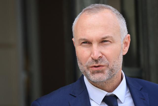 France's junior Minister in charge of parliament relations Laurent Panifous leaves after the weekly cabinet meeting at The Elysee Presidential Palace in Paris on May 20, 2026. (Photo by Ludovic MARIN / AFP)