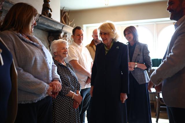 Britain's Queen Camilla pays a visit to The Parson’s Nose pub in Hillsborough, Northern Ireland on May 20, 2026, on the second day of a three-day royal visit to Northern Ireland. (Photo by Henry Nicholls / POOL / AFP)