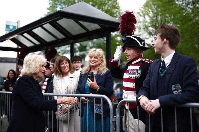 Britain's Queen Camilla meets well-wishers after visiting the village’s oldest shop in Hillsborough, Northern Ireland on May 20, 2026, on the second day of a three-day royal visit to Northern Ireland. (Photo by Henry Nicholls / POOL / AFP)