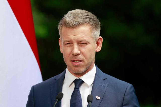 Hungary's Prime Minister Peter Magyar speaks during a joint press conference with Poland's Prime Minister at the garden of the Prime Minister's residency in Warsaw, Poland, on May 20, 2026. Hungary's new Prime Minister Peter Magyar is on a two-day visit to Poland for his first official trip abroad, hoping to mark his country's re-alignment with the European Union after years of open conflict under his predecessor. (Photo by Wojtek RADWANSKI / AFP)