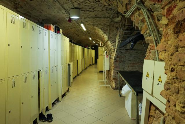 This photograph shows the basement of the European Humanities University, where people took shelter during an air raid alert, in Vilnius, Lithuania, on May 20, 2026. A drone alert sent by Lithuania's defence ministry to residents of the capital city Vilnius briefly brought transport to a standstill and caused people to flee to underground shelters. Alerts of this kind have been increasingly common in recent months in the Baltic states as a result of intensified Ukrainian strikes against Russian targets in the Saint Petersburg region, close to Estonia and Finland. But Wednesday's (May 20, 2026) alarm was the first in an EU and NATO member country since Russia's full-scale invasion of Ukraine began in 2022 to trigger a hunker-down alert for the population -- including the president, prime minister and MPs. (Photo by Andrei SHAULIUHA / AFP)